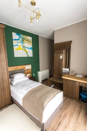 Фото номера Одноместный номер с балконом Отель Panorama Boutique Hotel г. Сфынту-Георге 5