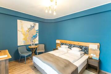 Фото номера Стандартный двухместный номер с 2 отдельными кроватями Отель Panorama Boutique Hotel г. Сфынту-Георге 3